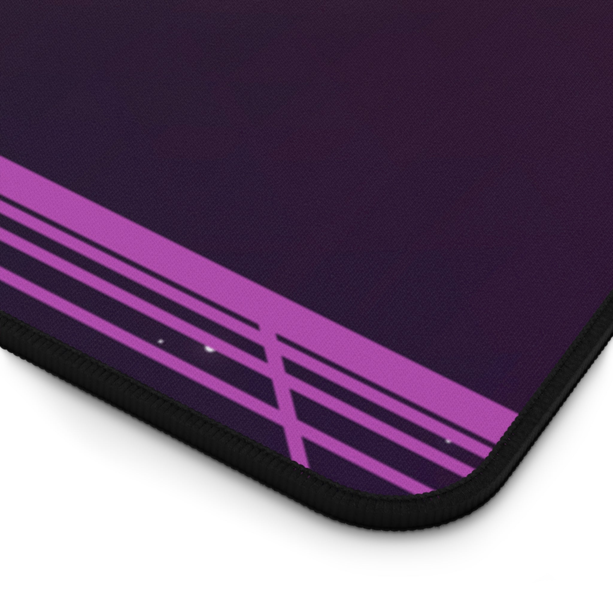 A vibrant pink large gaming mouse pad with anti-slip backing and hemmed edges, measuring 31 inches by 15.5 inches, designed for gamers and desk enthusiasts.