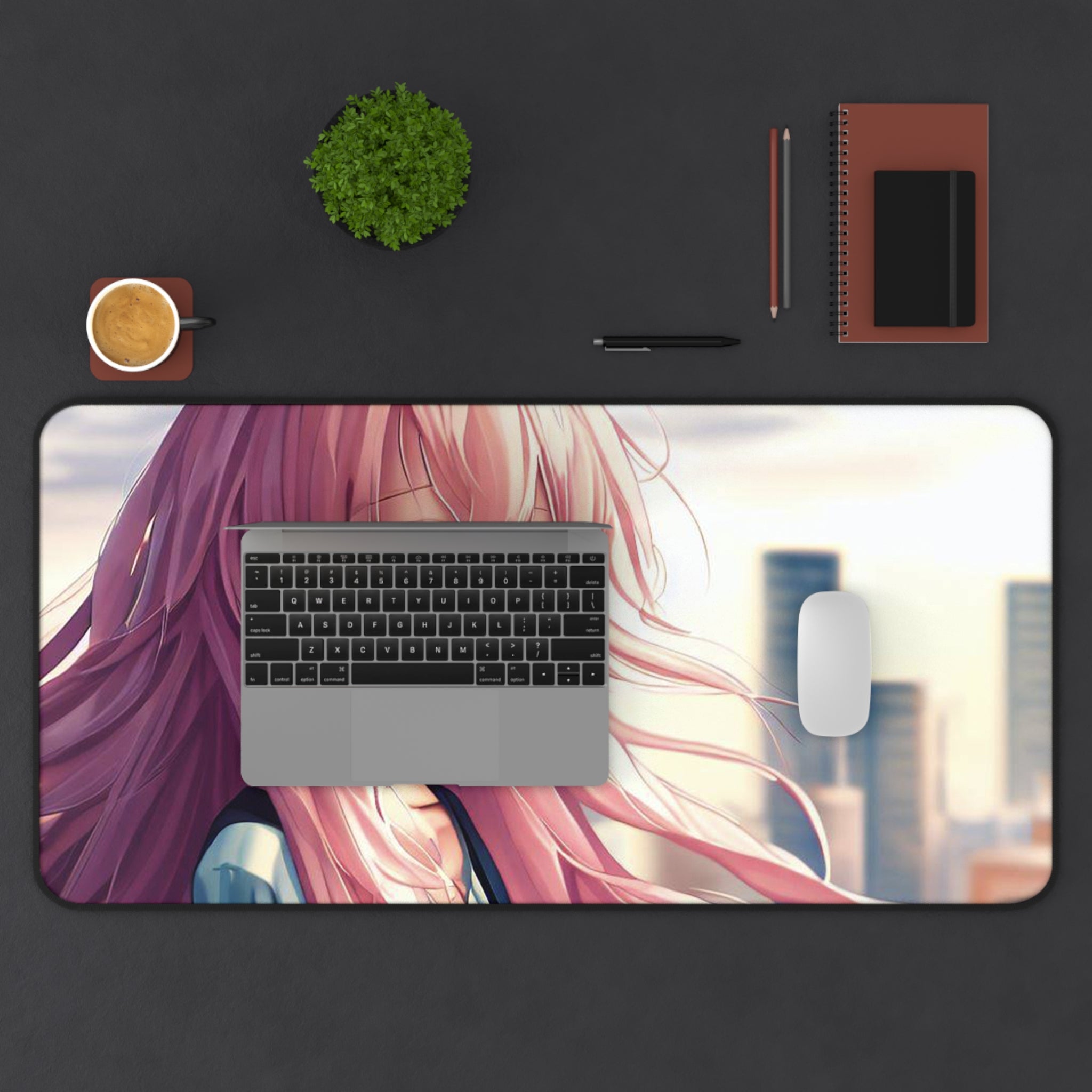 A vibrant pink hair anime girl desk mat featuring a smooth surface for mouse movement, with anti-slip backing and hemmed edges for durability.