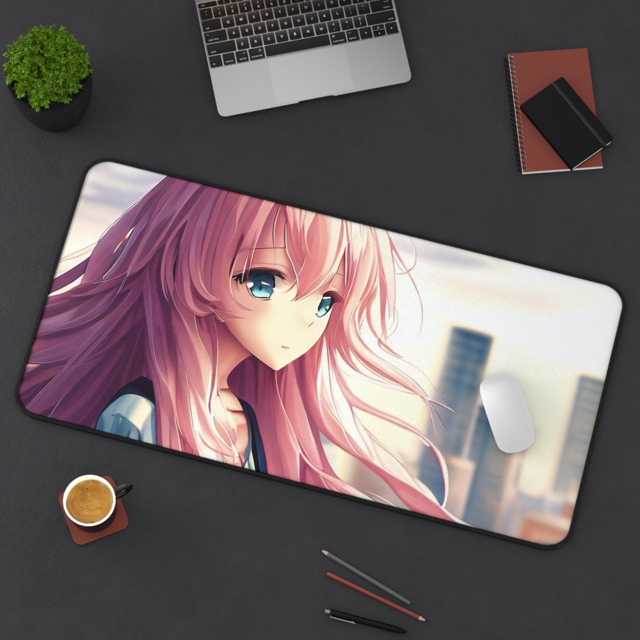 A vibrant pink hair anime girl desk mat featuring a smooth surface for mouse movement, with anti-slip backing and hemmed edges for durability.