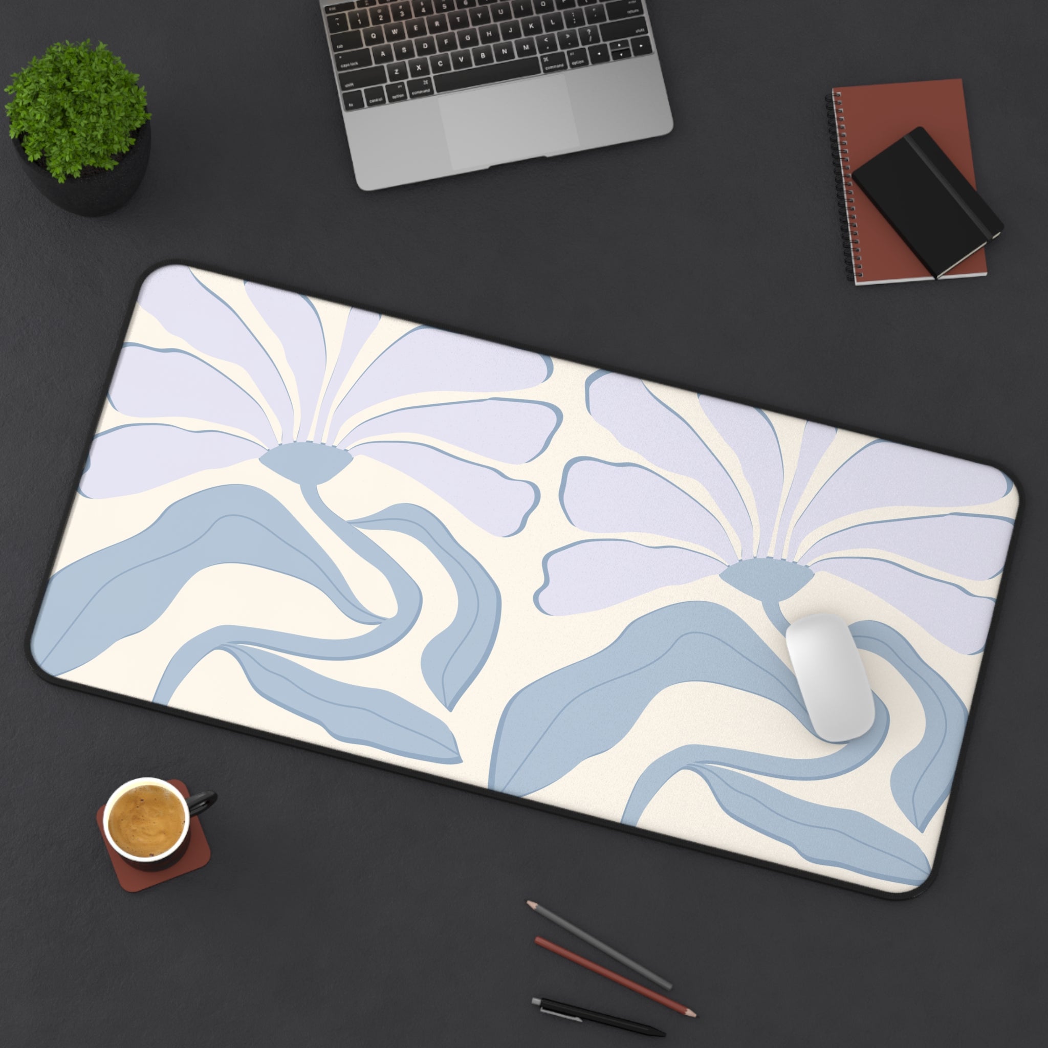 Purple Abstract Floral Desk Mat with vibrant floral design, made of durable neoprene material, featuring anti-slip backing and hemmed edges.