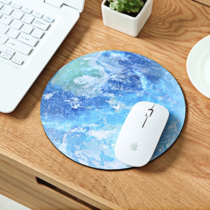 The Earth Mouse Pad featuring a smooth surface and anti-slip rubber base, designed for comfort and optimal mouse movement.