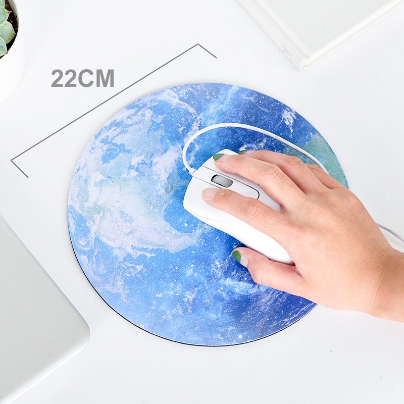 The Earth Mouse Pad featuring a smooth surface and anti-slip rubber base, designed for comfort and optimal mouse movement.