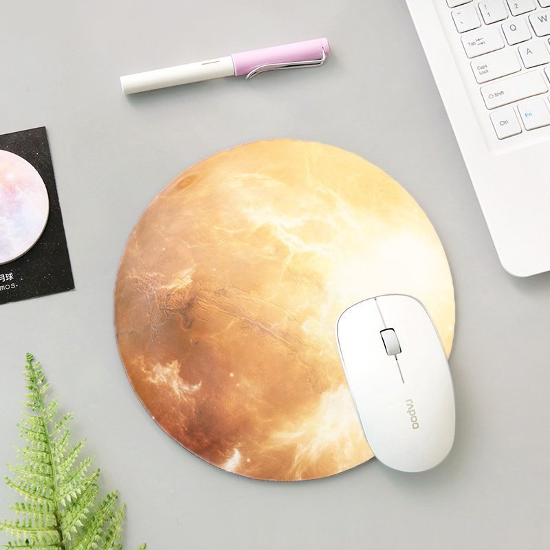 The Mars Mouse Pad featuring a smooth surface and anti-slip rubber base, designed for optimal mouse performance and comfort.