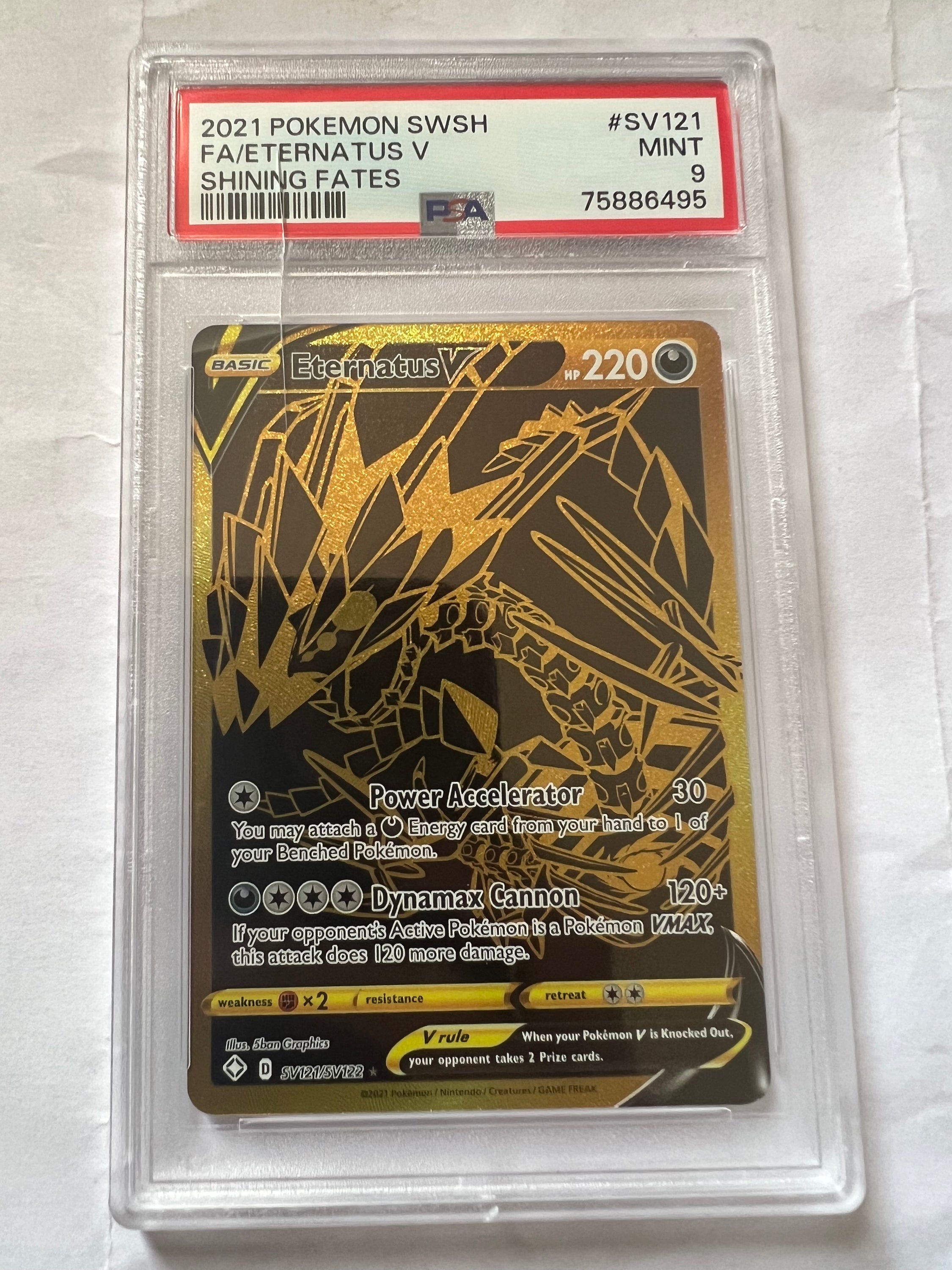 Shiny Eternatus V #SV121 Pokémon card from Shining Fates set, graded PSA 9, featuring full art design and foil finish.