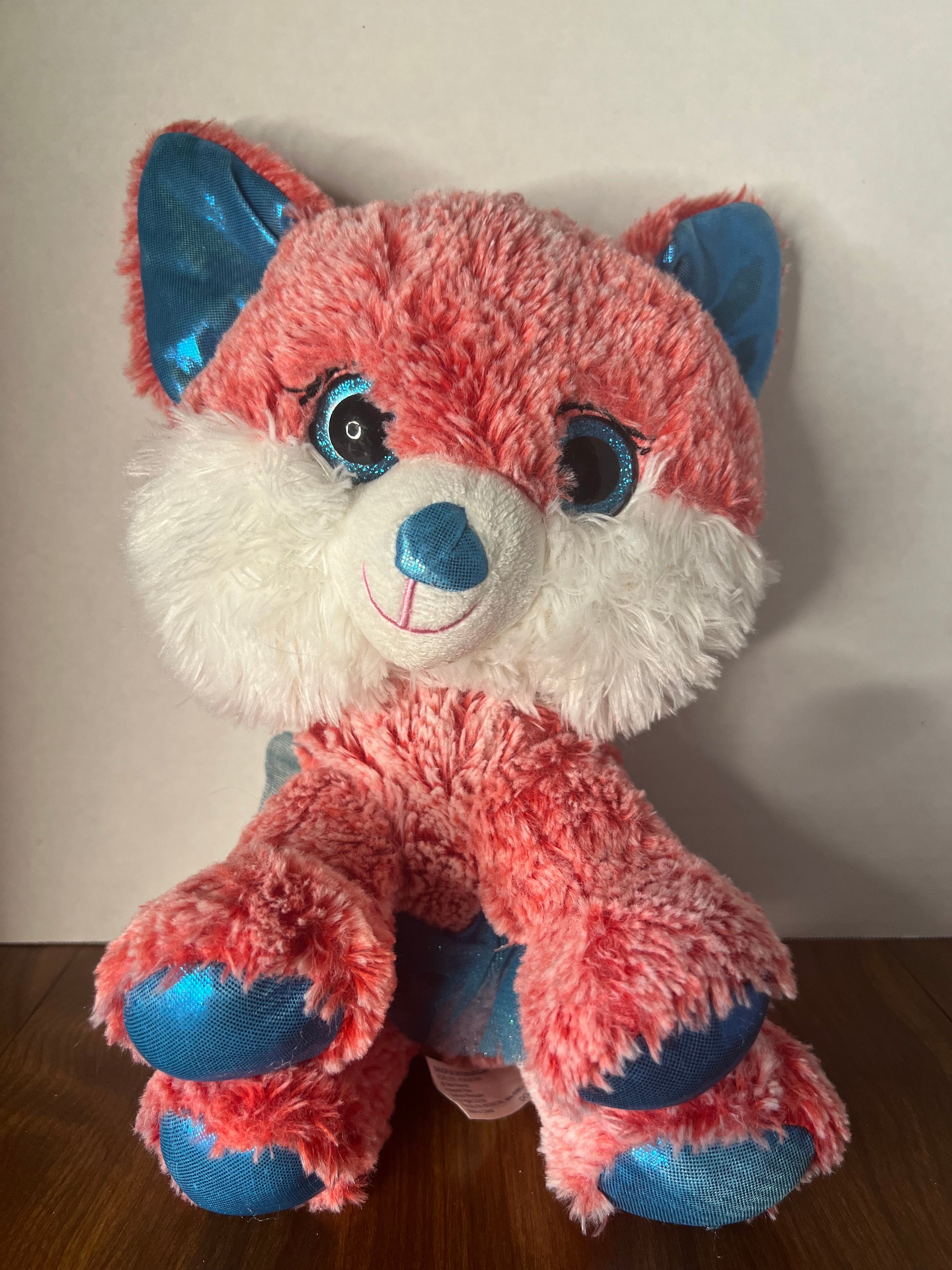 HugFun Princess Fox Dog plush toy in pink and blue tutu, perfect for children.