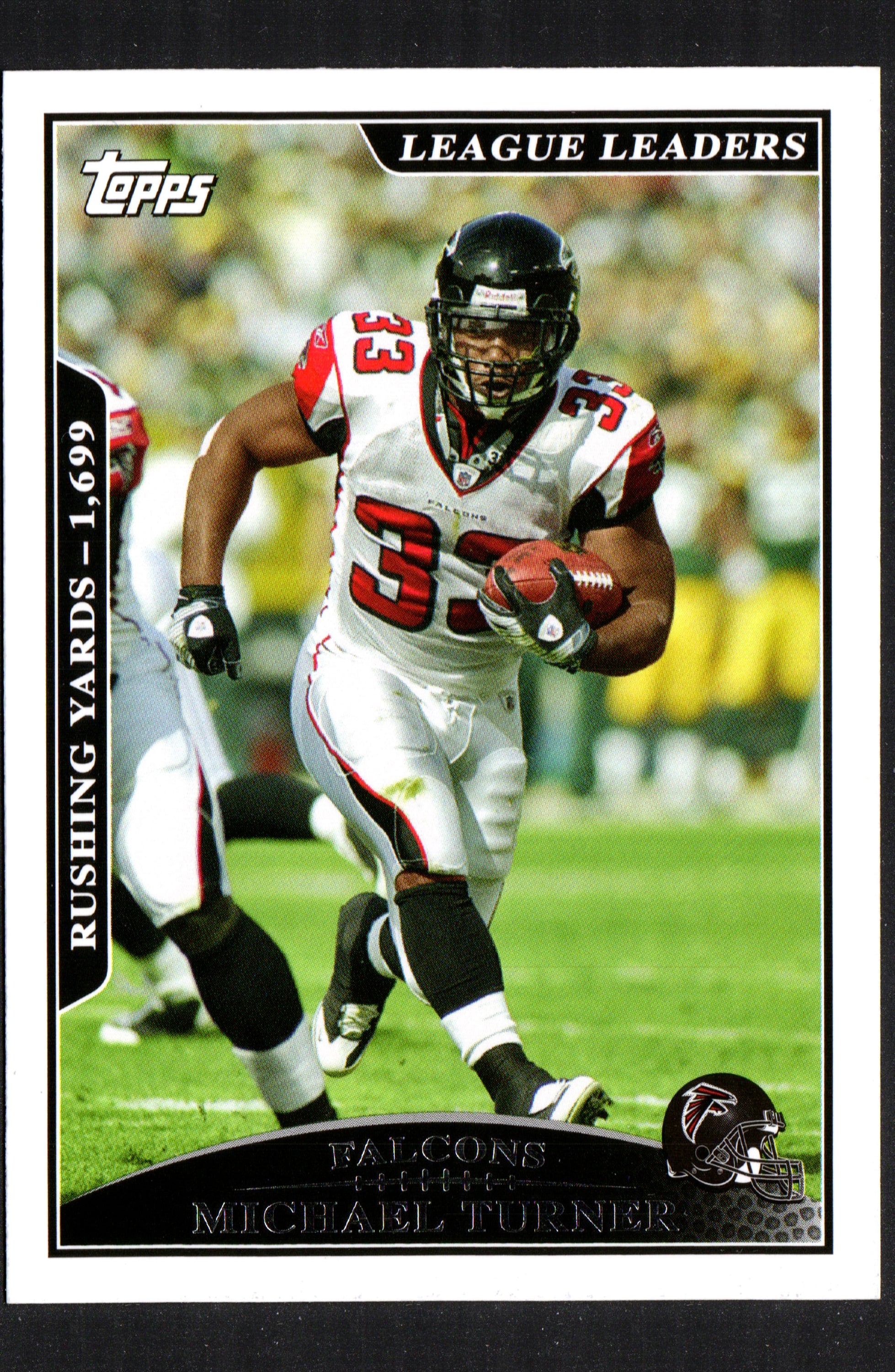 2009 Topps trading card featuring Michael Turner, Atlanta Falcons running back, numbered 285.