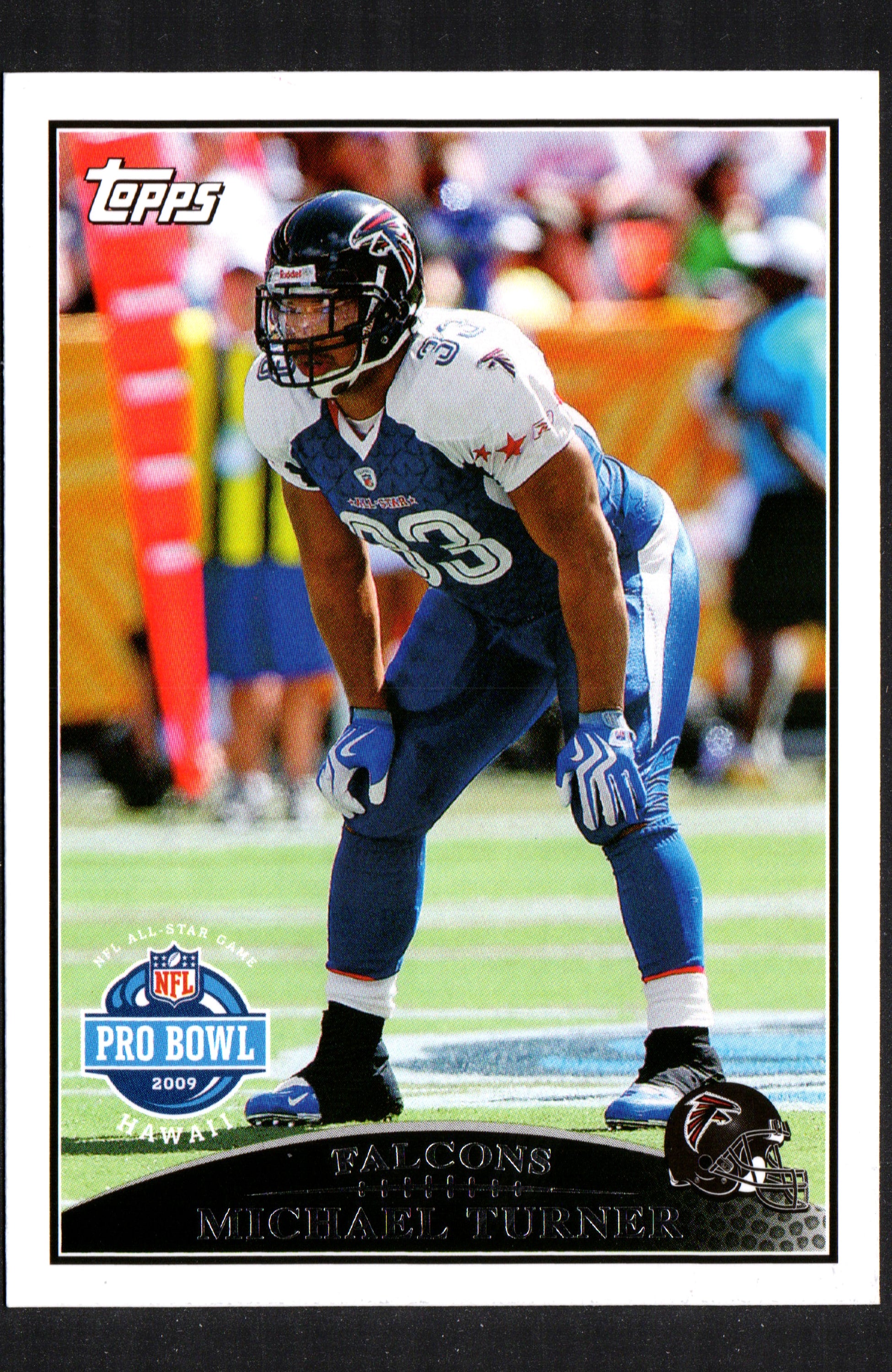 2009 Topps trading card featuring Michael Turner in Atlanta Falcons uniform, card number 299.