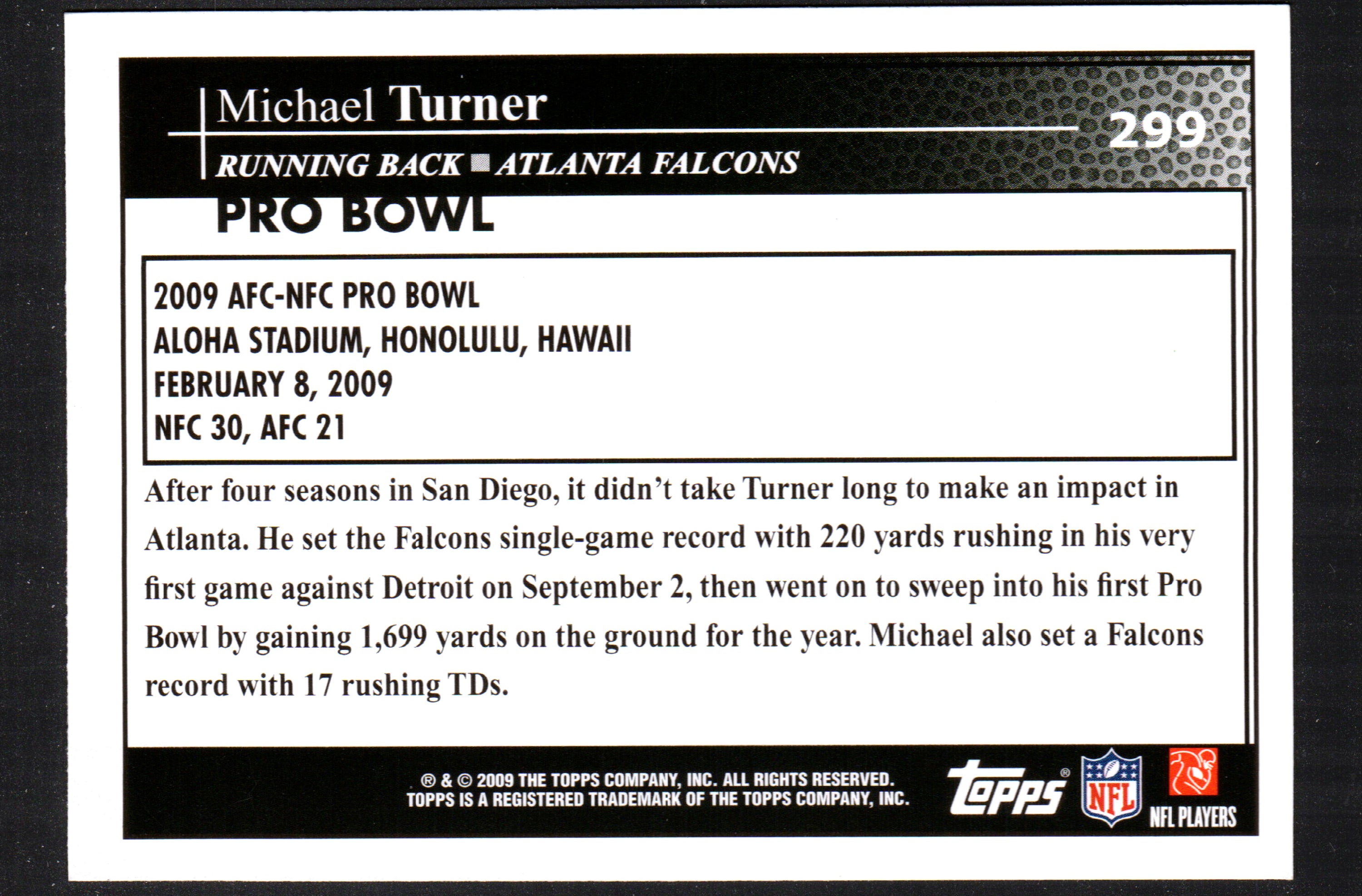 2009 Topps trading card featuring Michael Turner in Atlanta Falcons uniform, card number 299.