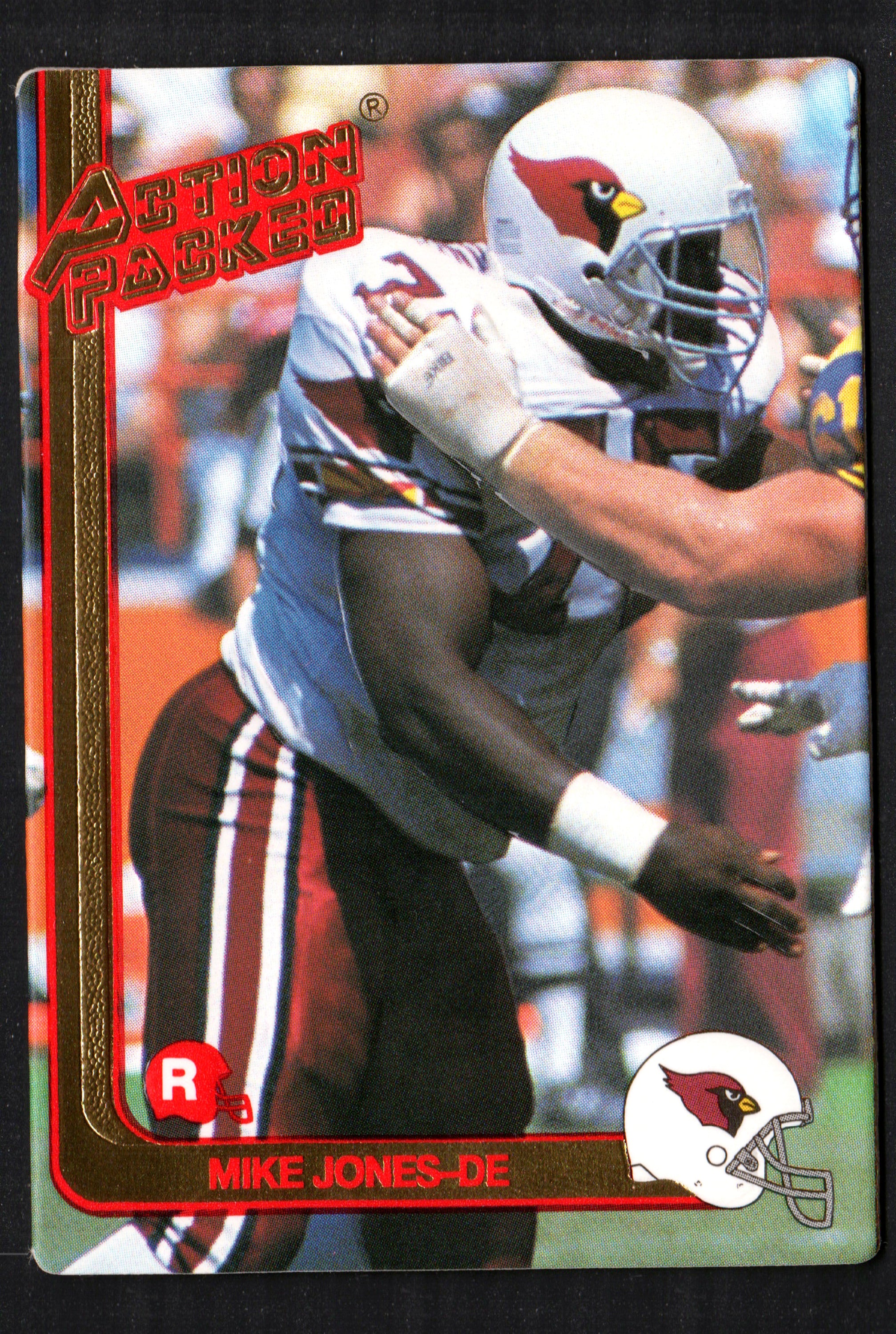 1991 Action Packed trading card featuring Mike Jones of the Phoenix Cardinals in action on the field.