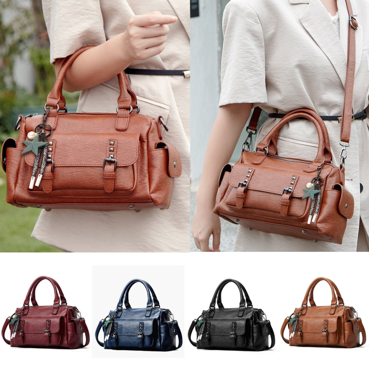 048 Pebbled Leather Multi-compartment Handbag in a stylish design, showcasing its large capacity and crossbody functionality.