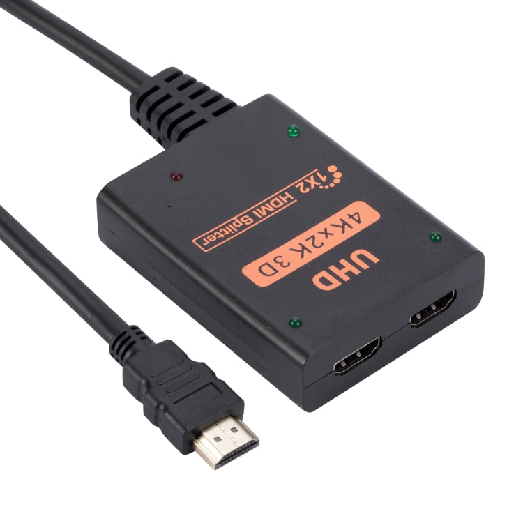 1 into 2 out HDMI 4K HD Video Splitter with power supply cord, showcasing its compact design and ports.