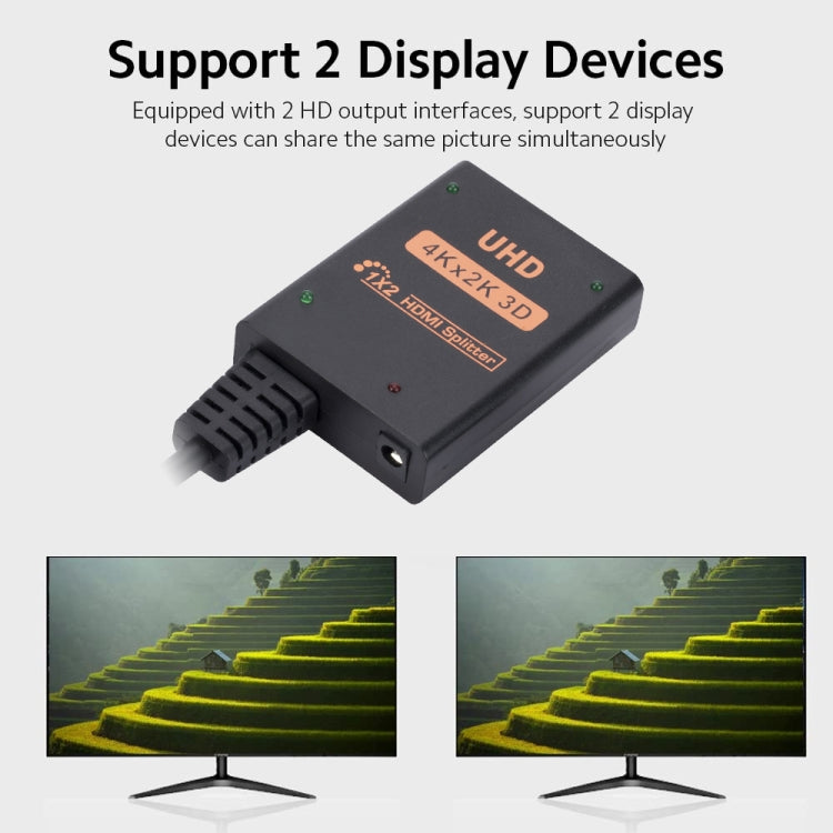 1 into 2 out HDMI 4K HD Video Splitter with power supply cord, showcasing its compact design and ports.