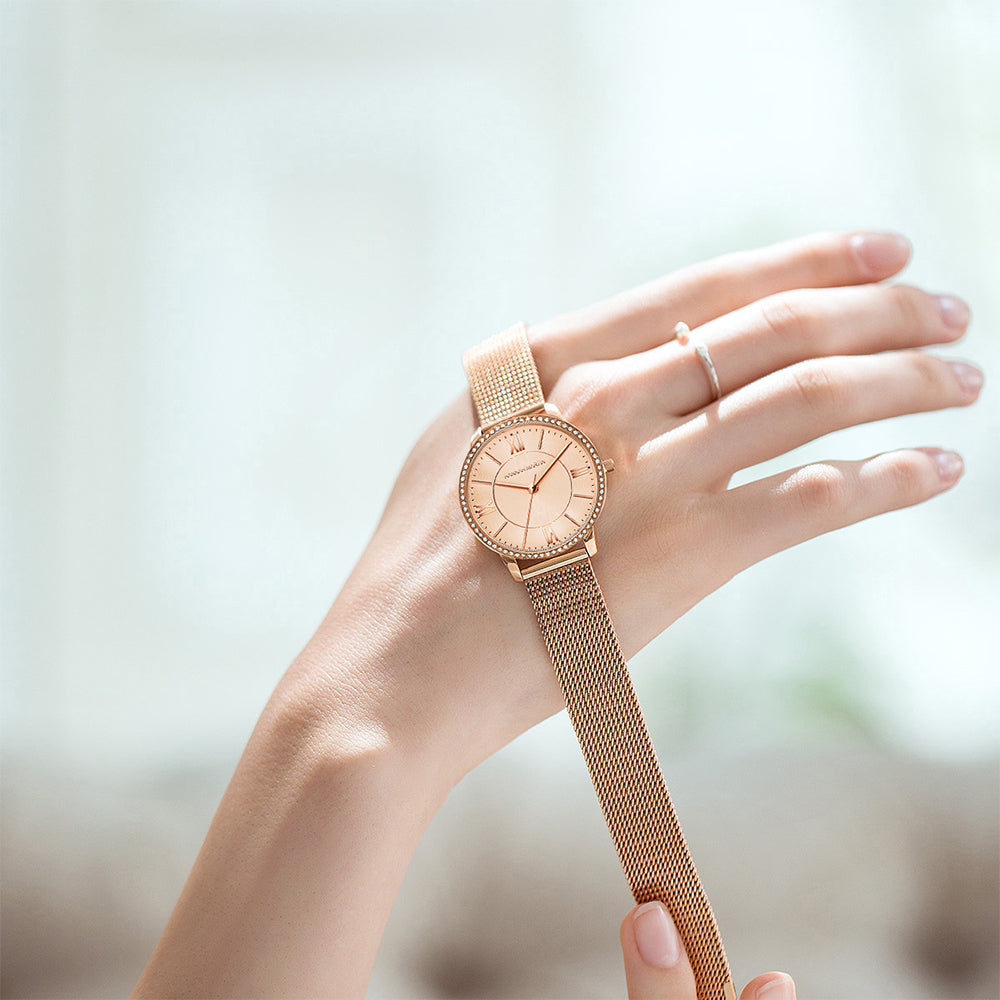 Elegant women's watch and bracelet set featuring rhinestones and a stylish design, perfect for casual and formal occasions.