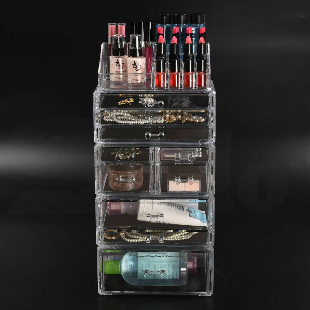 Clear acrylic 10 drawers cosmetic makeup organizer with jewelry storage, stylish and functional design for makeup enthusiasts.