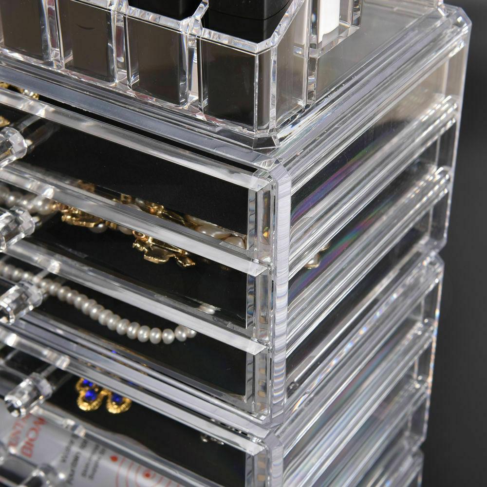 Clear acrylic 10 drawers cosmetic makeup organizer with jewelry storage, stylish and functional design for makeup enthusiasts.