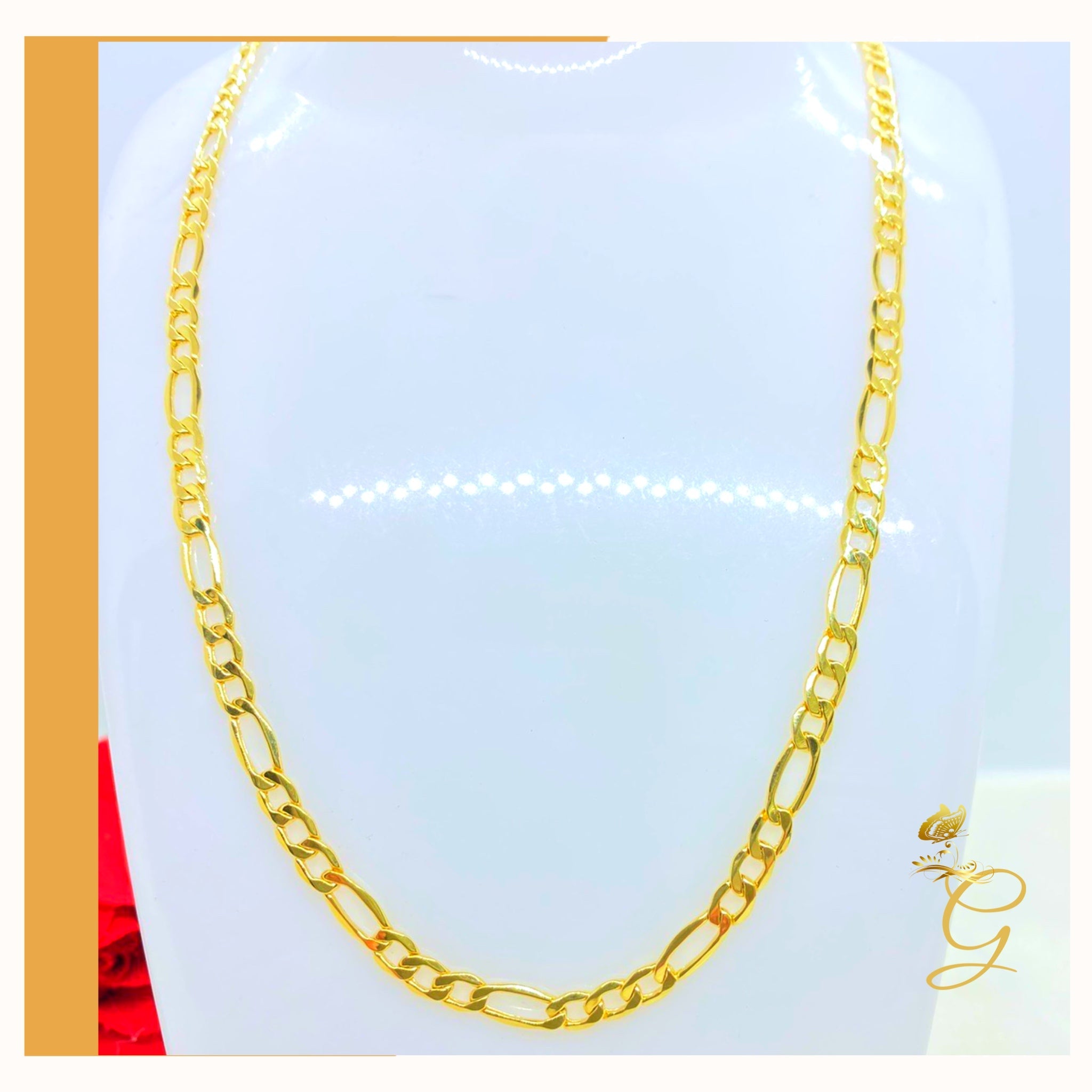 A 10K gold solid Figaro chain for men, 24 inches long and 4.98MM wide, showcasing its elegant design and yellow gold color.