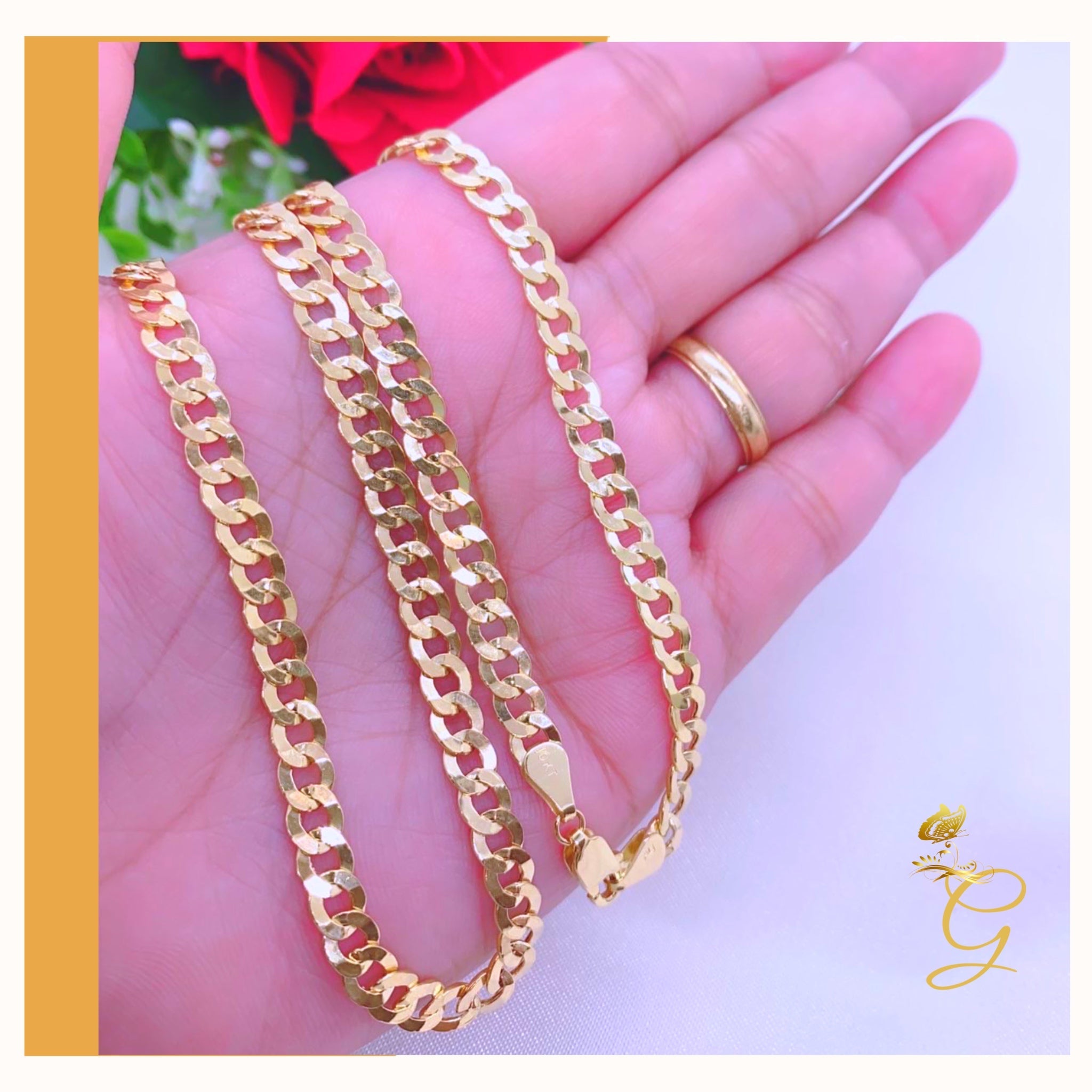 A 10K Gold Cuban Link Chain, 24 inches long with a 5.53MM width, showcasing its solid yellow gold design.