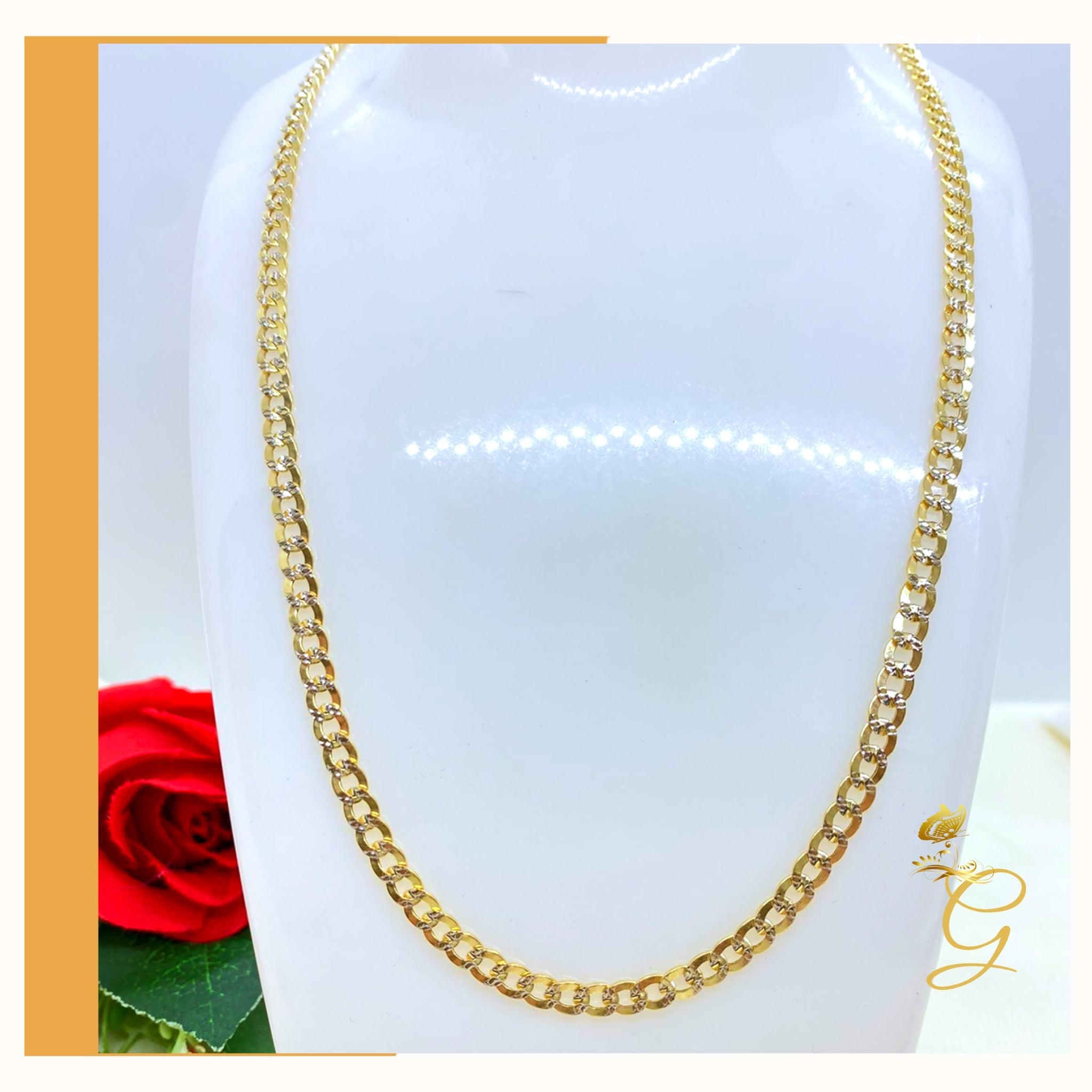 A stunning 10K Gold Diamond Cut Cuban Link Chain, 24 inches long with a width of 4.41 mm, showcasing its elegant design and solid gold material.