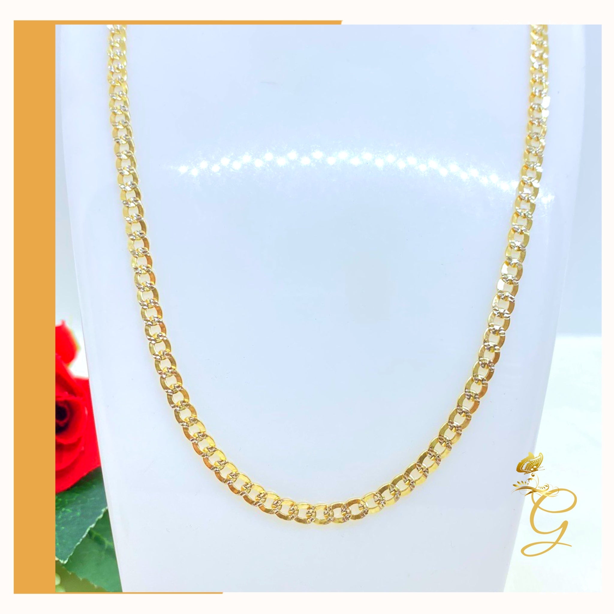 A stunning 10K Gold Diamond Cut Cuban Link Chain, 24 inches long with a width of 4.41 mm, showcasing its elegant design and solid gold material.