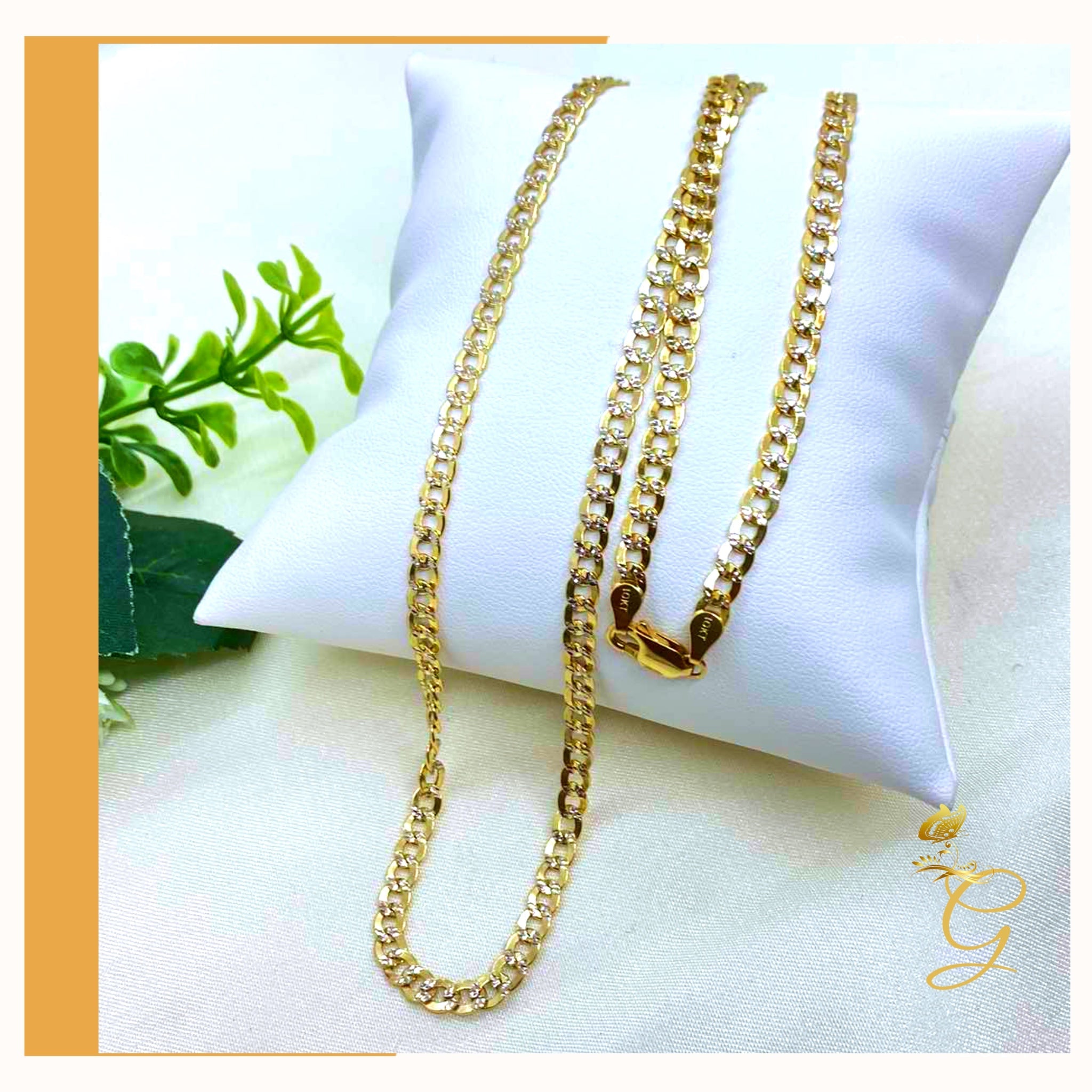 A stunning 10K Gold Diamond Cut Cuban Link Chain, 24 inches long with a width of 4.41 mm, showcasing its elegant design and solid gold material.