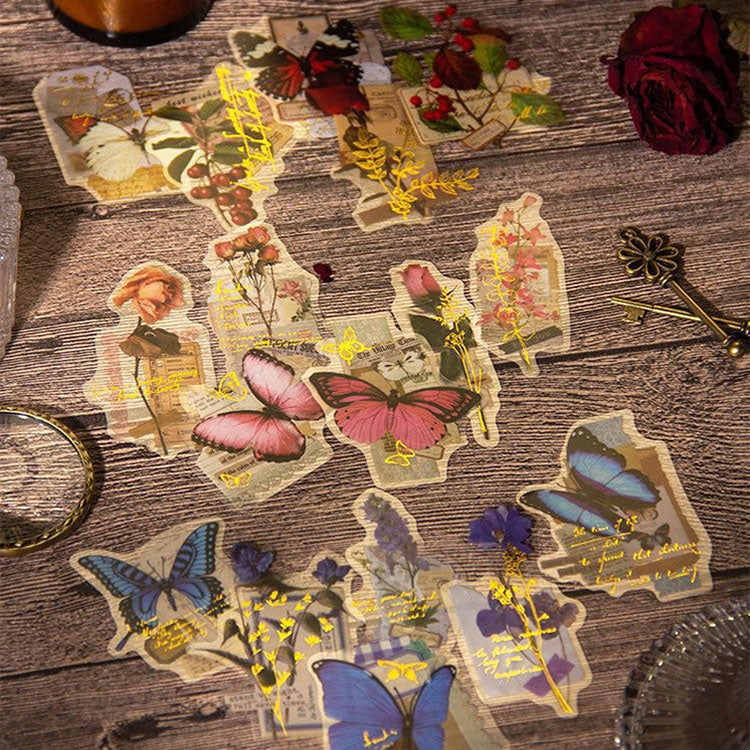 A pack of 15 retro butterfly flower stickers made from durable PET material, showcasing vibrant colors and intricate designs.