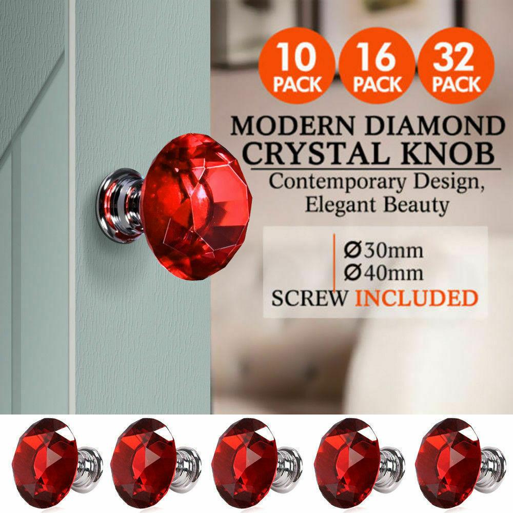 Set of 16 clear crystal knobs with diamond shape, 30mm diameter, ideal for cabinets and drawers, showcasing a polished chrome finish.