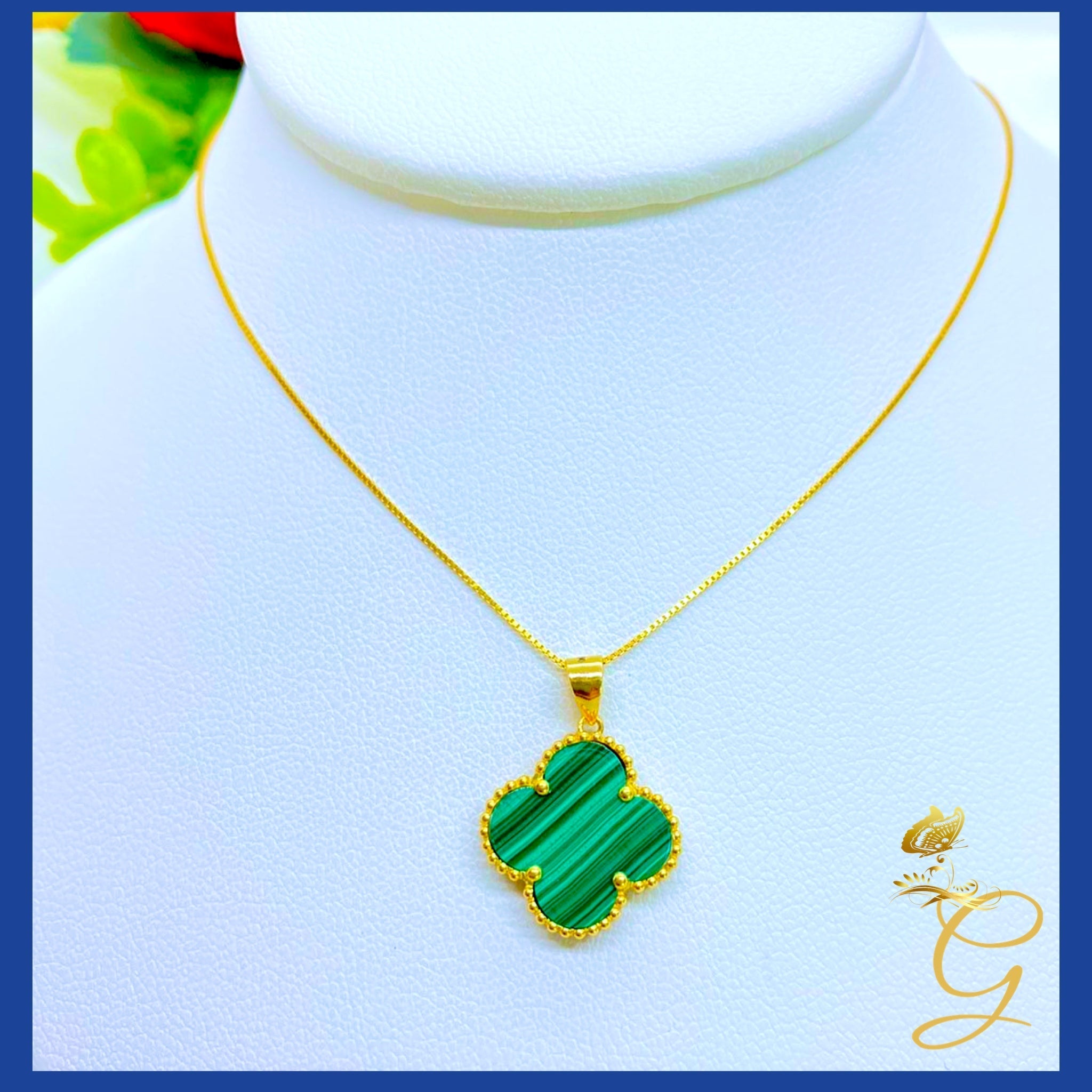 18K Real Gold 15mm Green Cloverleaf Necklace displayed elegantly, showcasing its intricate design and solid gold craftsmanship.