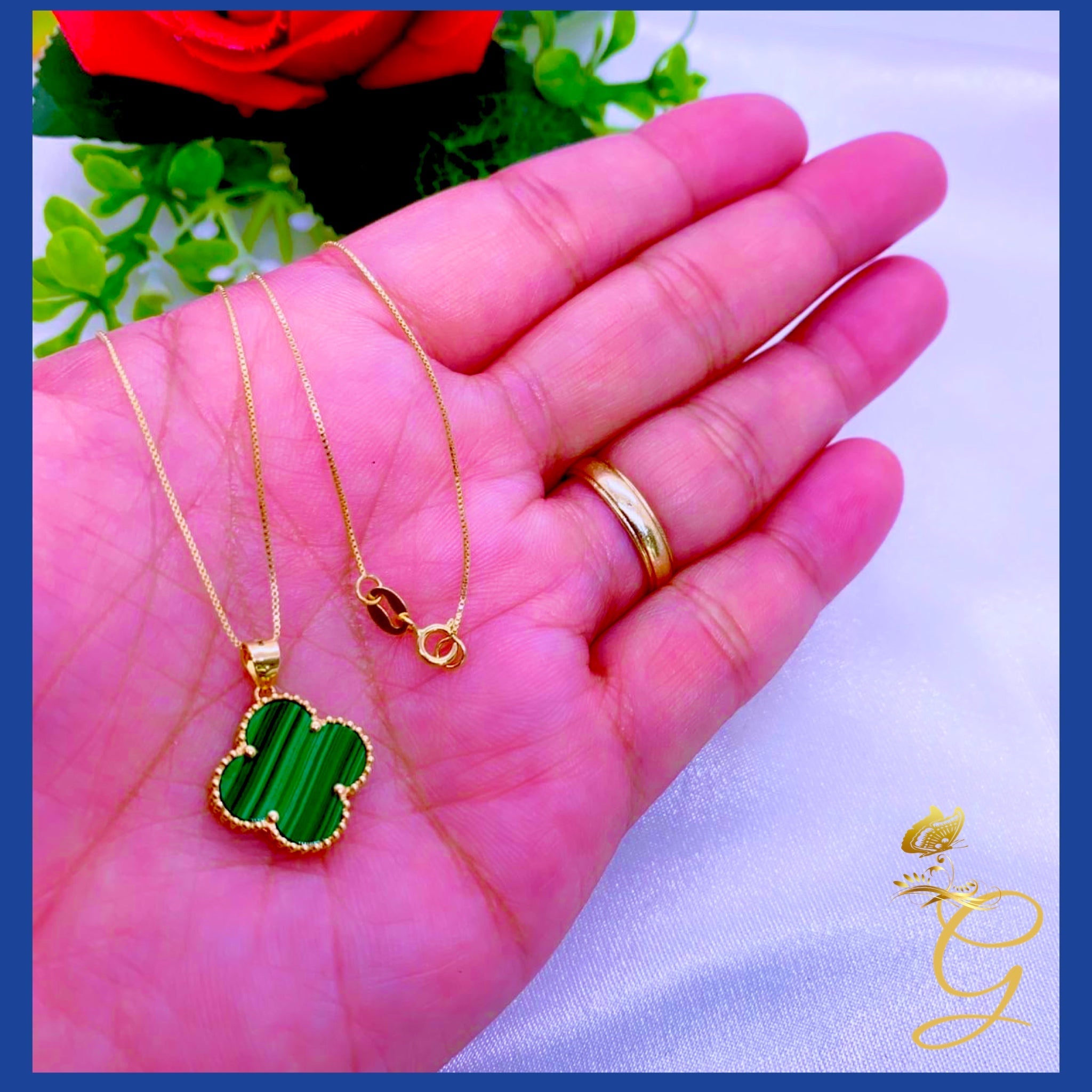 18K Real Gold 15mm Green Cloverleaf Necklace displayed elegantly, showcasing its intricate design and solid gold craftsmanship.