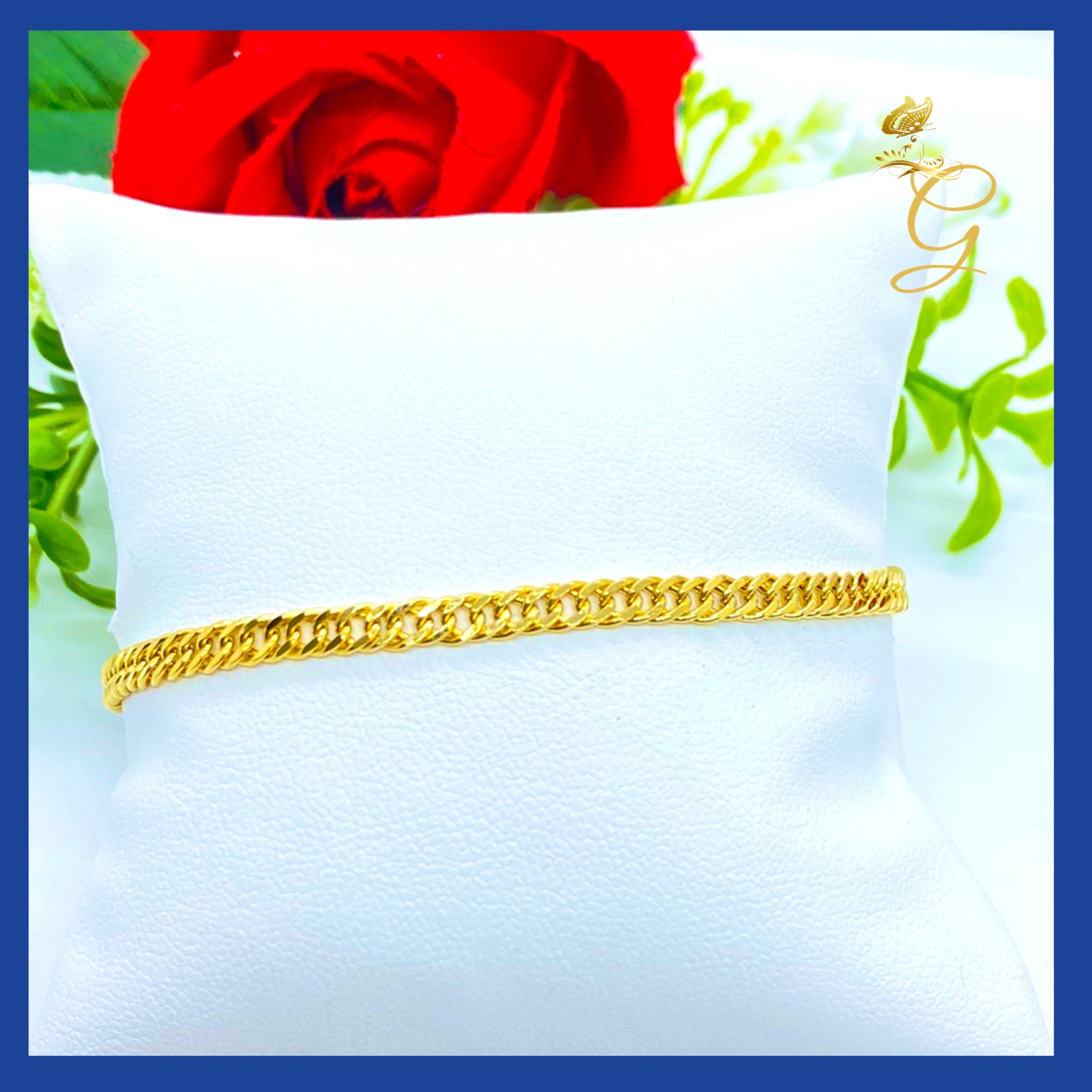 Elegant 18K Real Gold Curb Link Bracelet, showcasing a classic design with a warm yellow gold finish.