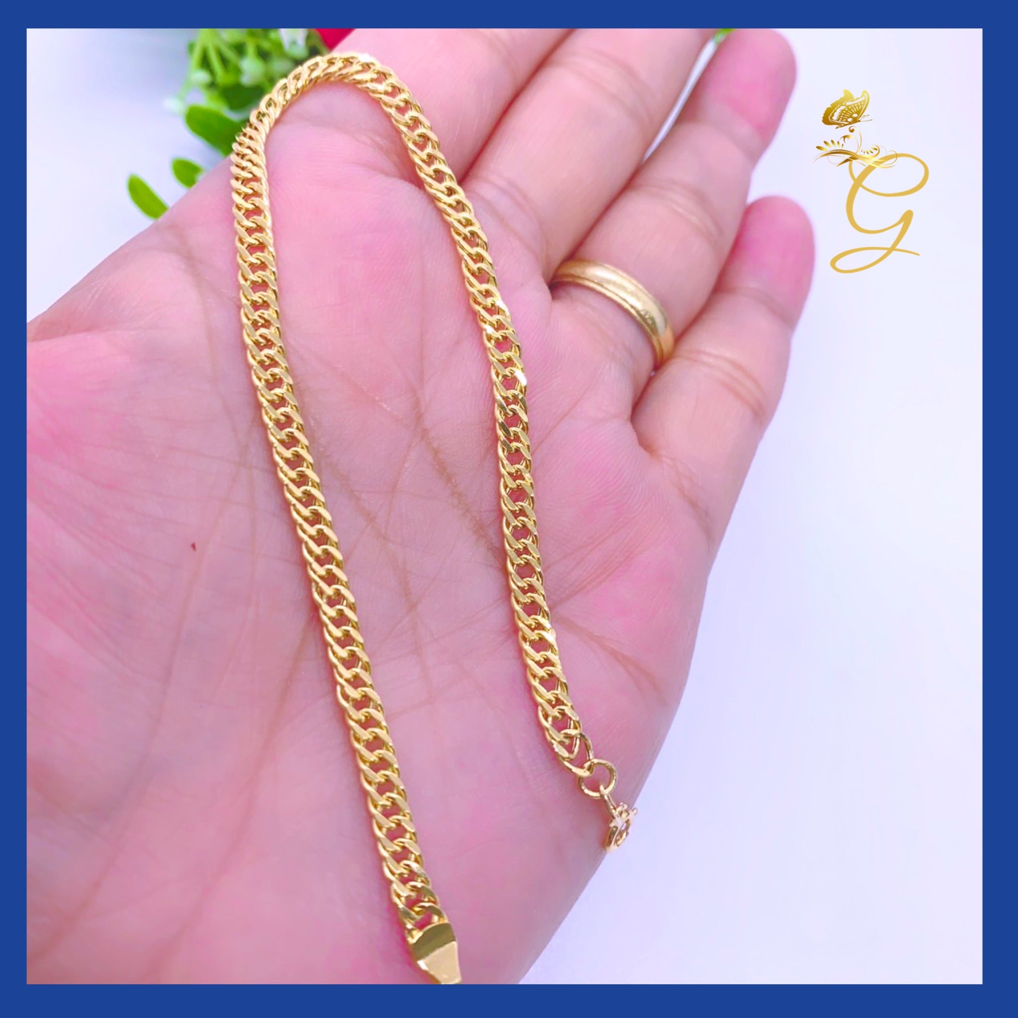 Elegant 18K Real Gold Curb Link Bracelet, showcasing a classic design with a warm yellow gold finish.