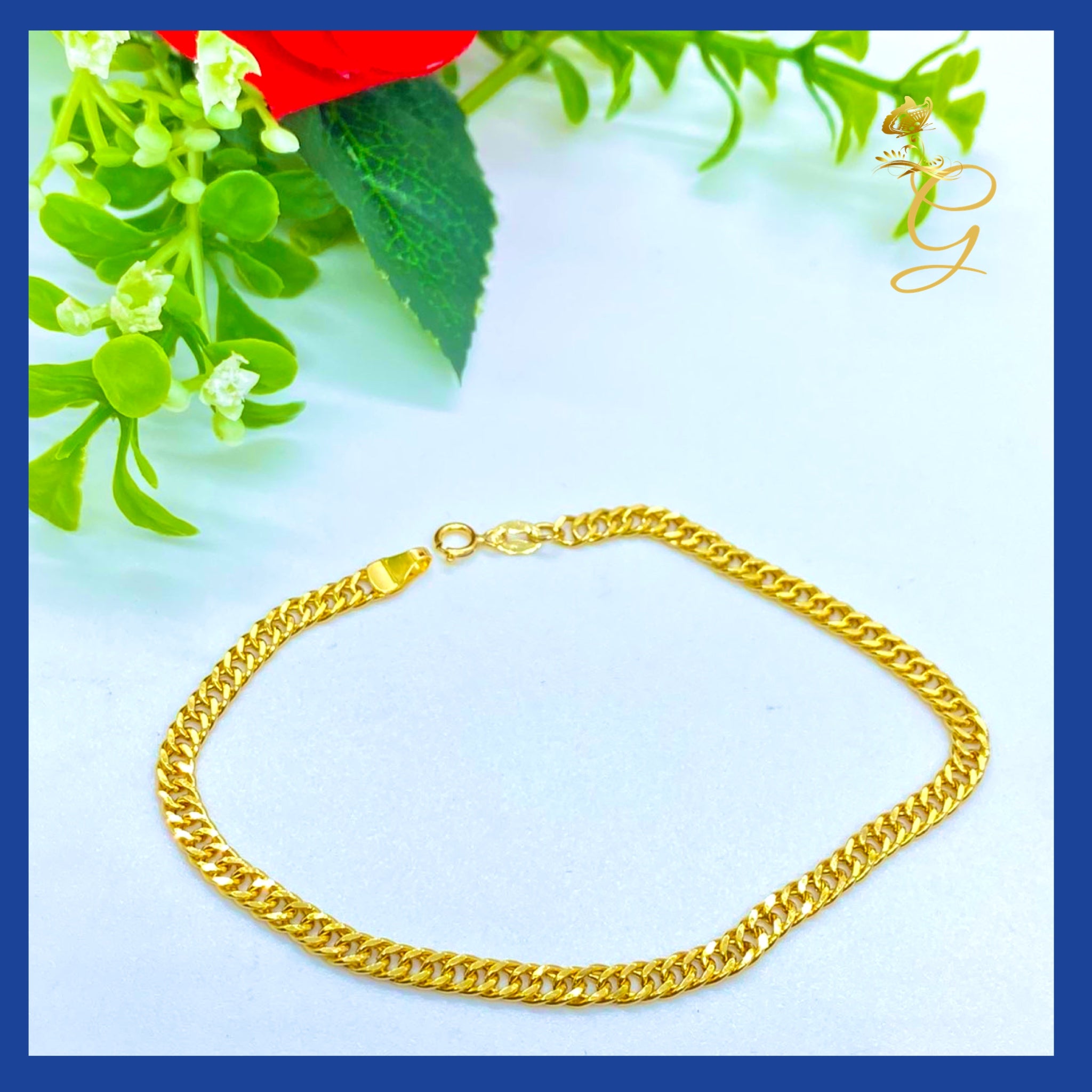 Elegant 18K Real Gold Curb Link Bracelet, showcasing a classic design with a warm yellow gold finish.