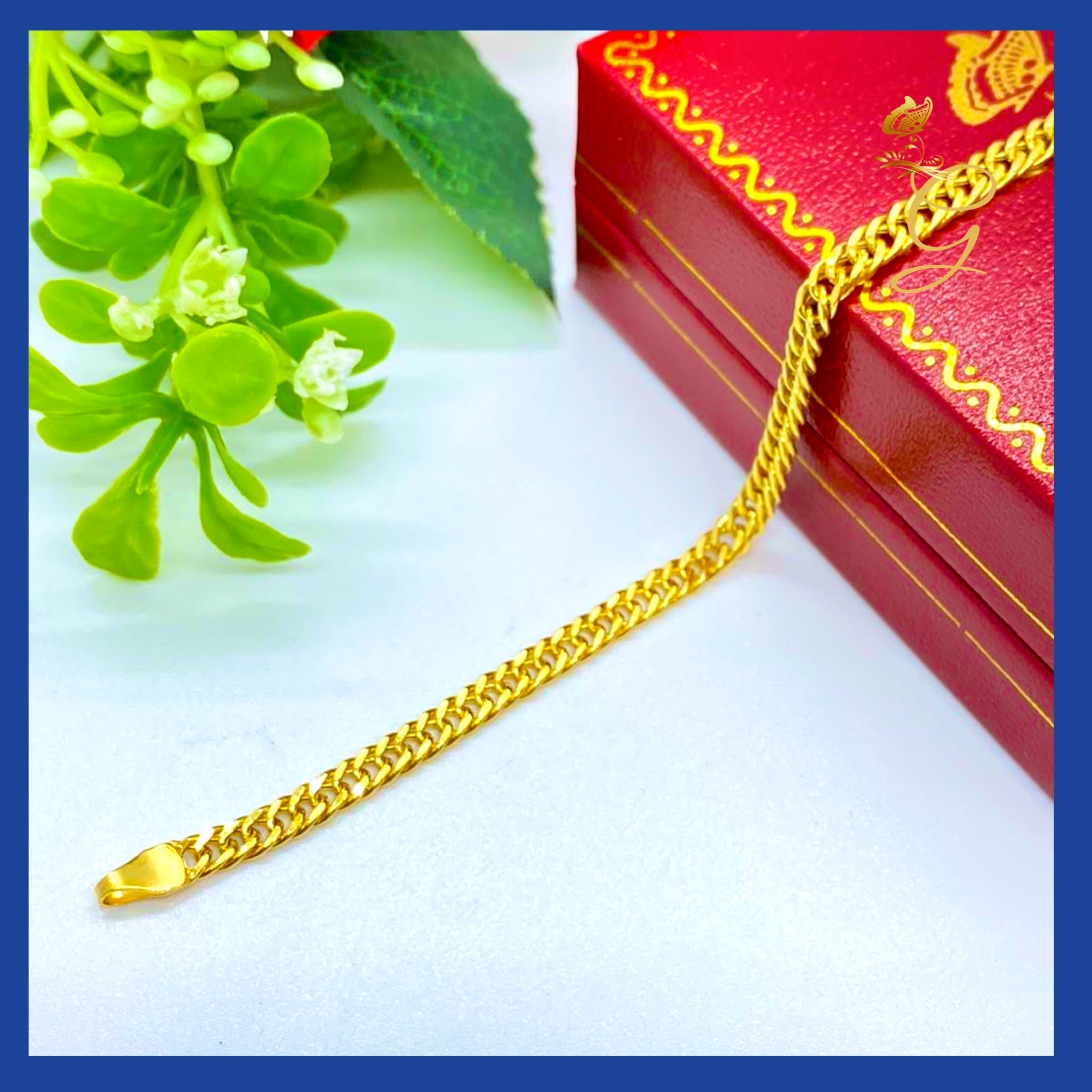 Elegant 18K Real Gold Curb Link Bracelet, showcasing a classic design with a warm yellow gold finish.