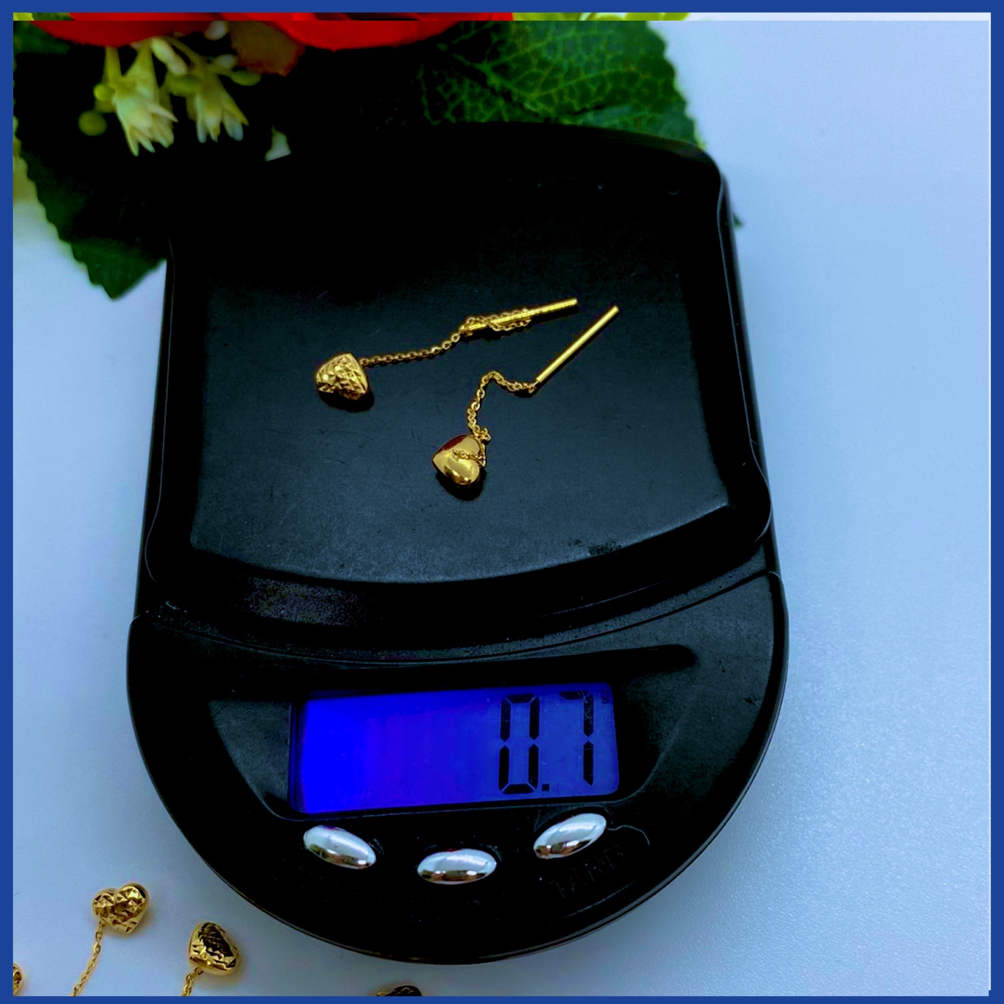 Elegant 18K real gold heart drop earrings, showcasing a stylish design with a rich yellow gold finish.