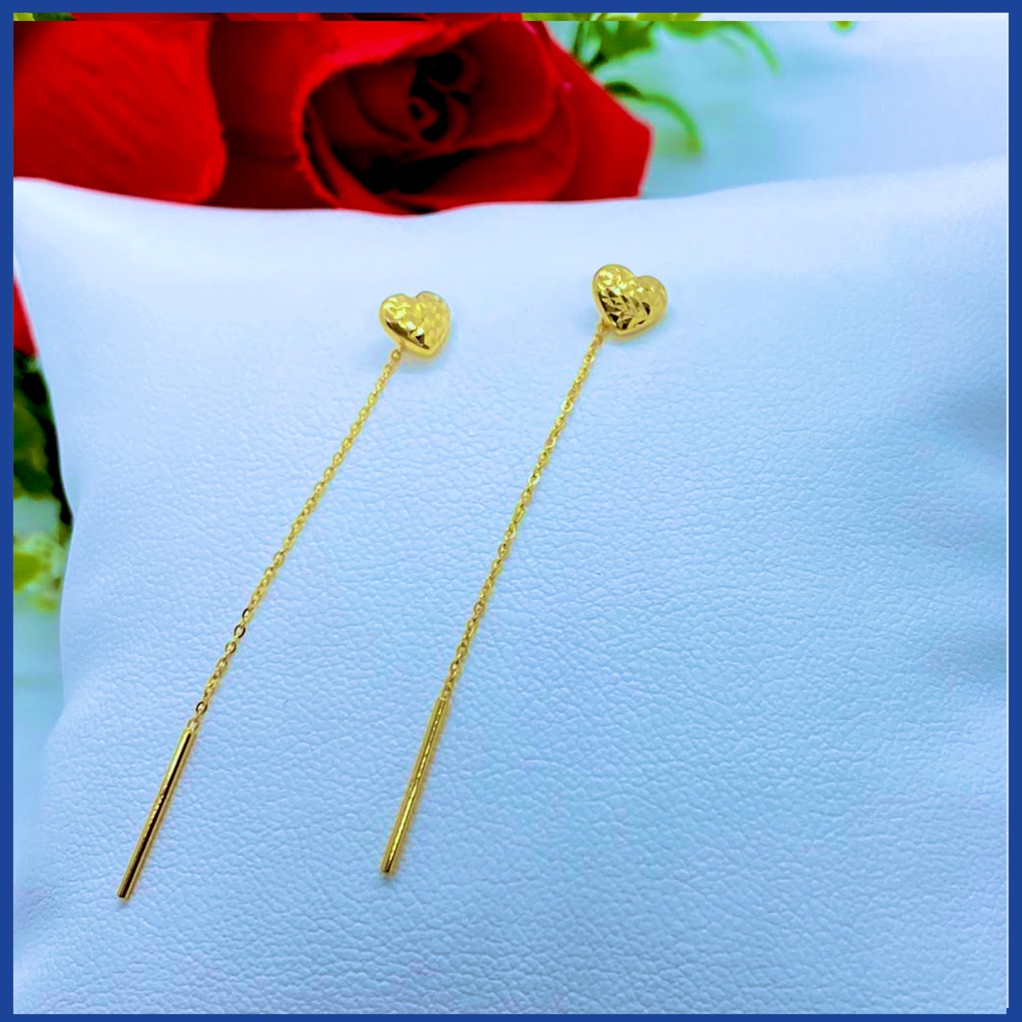 Elegant 18K real gold heart drop earrings, showcasing a stylish design with a rich yellow gold finish.