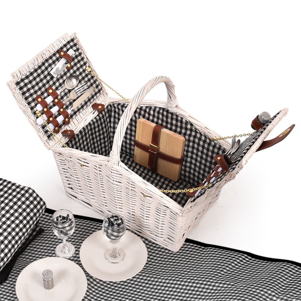 Deluxe 2 Person Picnic Basket Set with wicker design, including wine glasses, plates, and a matching blanket, perfect for outdoor gatherings.