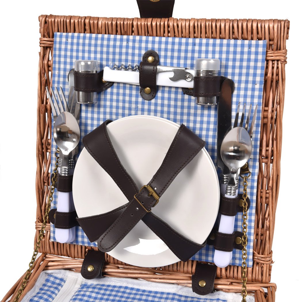 A stylish 2 person picnic basket set made of willow, featuring insulated storage, PU leather straps, and a matching blanket for outdoor dining.