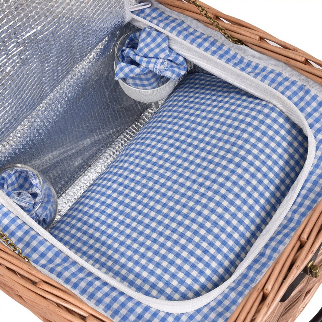 A stylish 2 person picnic basket set made of willow, featuring insulated storage, PU leather straps, and a matching blanket for outdoor dining.