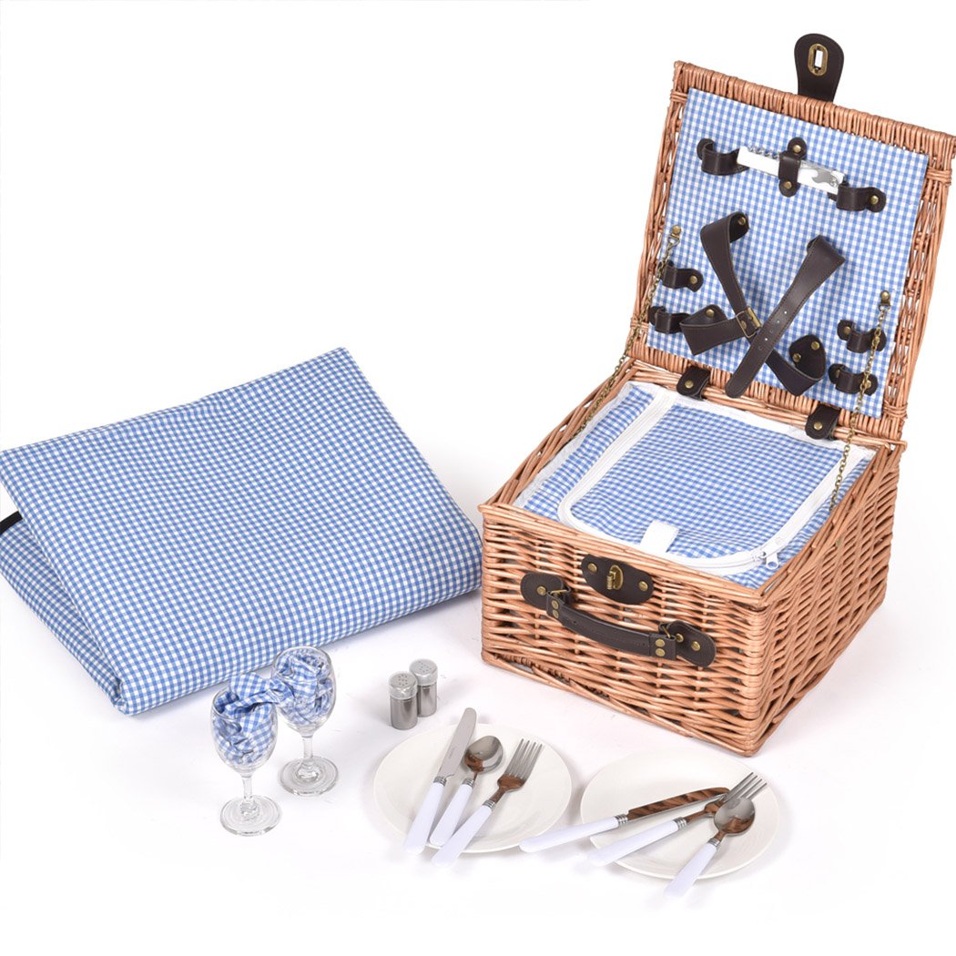 A stylish 2 person picnic basket set made of willow, featuring insulated storage, PU leather straps, and a matching blanket for outdoor dining.