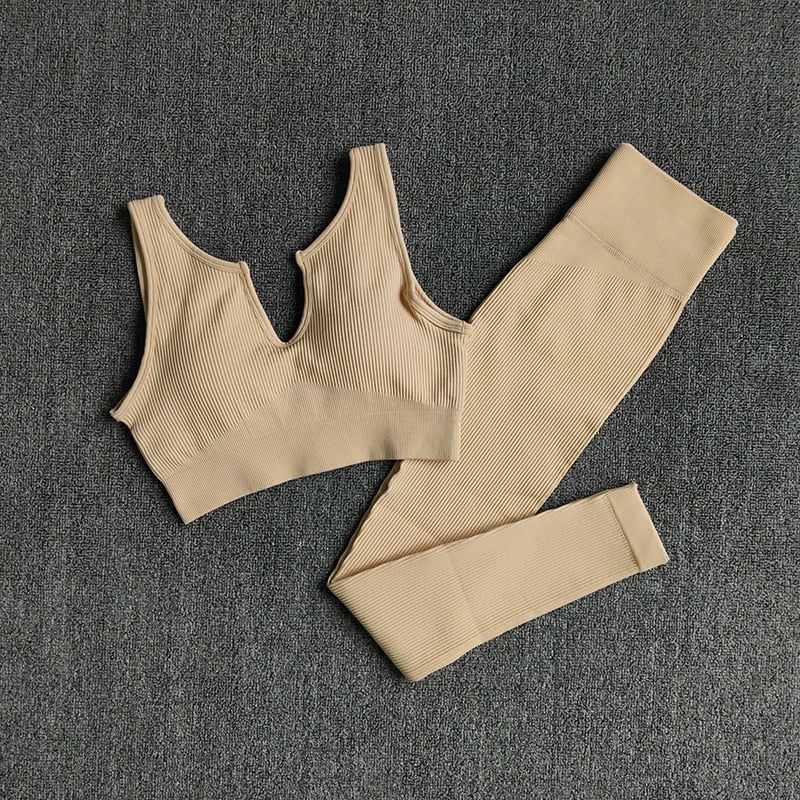 A stylish 2 pieces seamless yoga set for women, featuring high waist leggings and a matching sports bra in various colors.