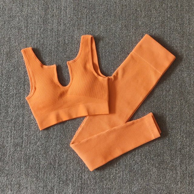 A stylish 2 pieces seamless yoga set for women, featuring high waist leggings and a matching sports bra in various colors.