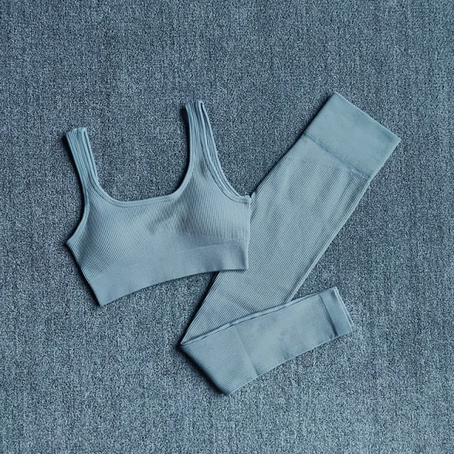 A stylish 2 pieces seamless yoga set for women, featuring high waist leggings and a matching sports bra in various colors.