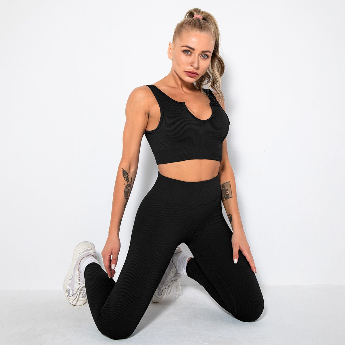 A stylish 2 pieces seamless yoga set for women, featuring high waist leggings and a matching sports bra in various colors.