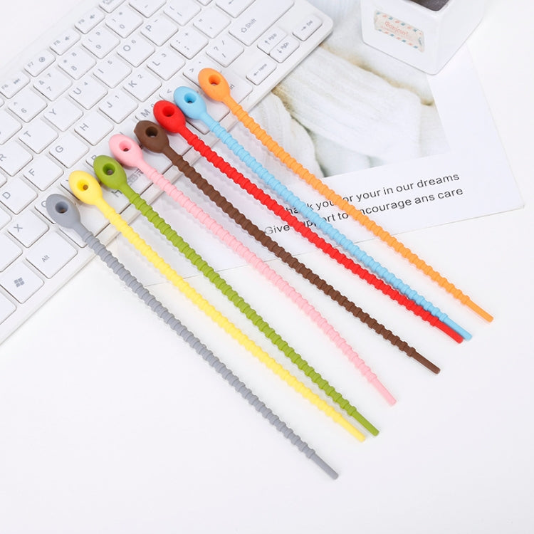 20 PCS green silicone cable storage straps neatly arranged, showcasing their flexibility and self-locking buckle design.