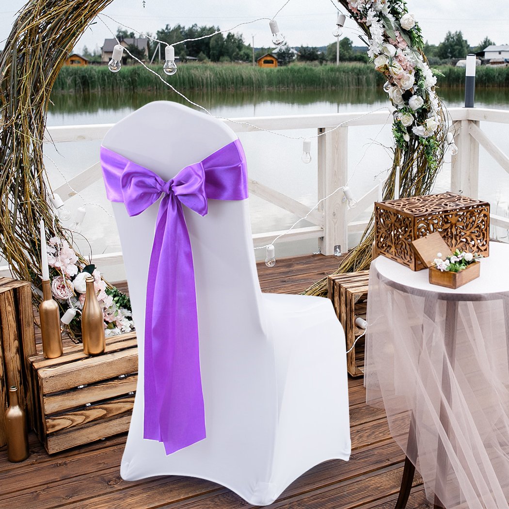 20 satin chair sashes in elegant colors, perfect for wedding and event decoration, showcasing their luxurious fabric and versatility.