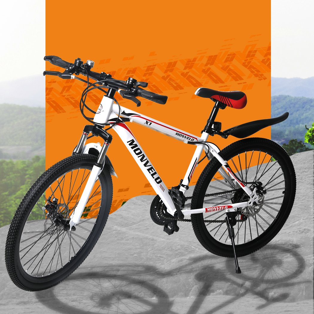 21-Speed Mountain Bicycle with dual disc brakes and front suspension, showcasing a sleek carbon steel frame and ergonomic saddle.