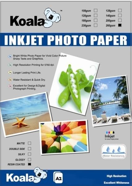 A stack of 20 sheets of 260gsm A2 RC glossy photo paper, showcasing its high-quality glossy finish and sturdy texture.