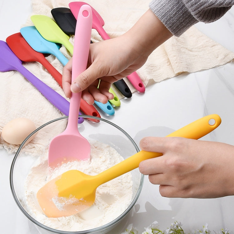 Two purple silicone square cake scrapers with rounded handles, ideal for baking and food preparation.