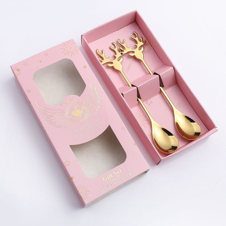 Two Christmas-themed 304 stainless steel deer stirring spoons, featuring a festive design perfect for holiday beverages.