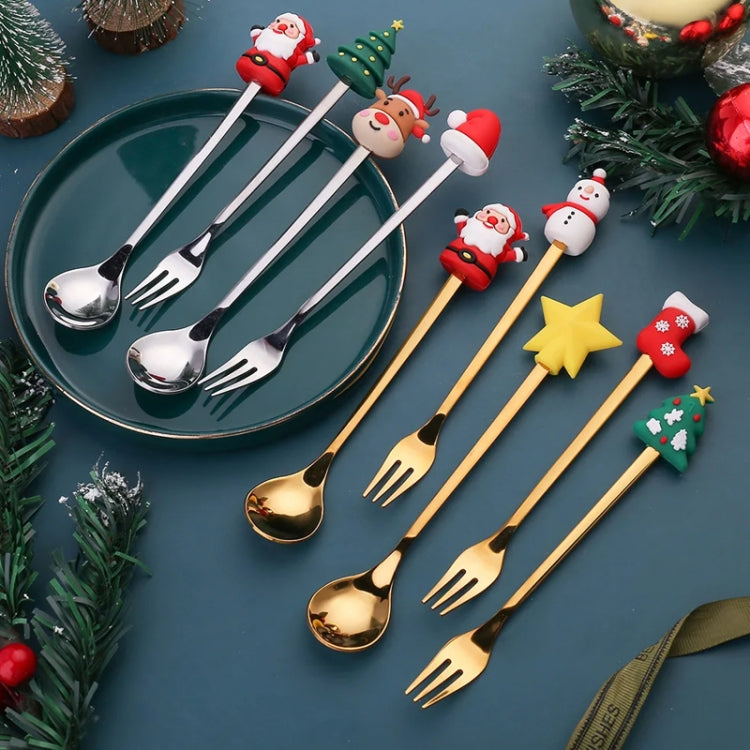 A cute 2pcs Christmas Dessert Fork and Spoon Set featuring cartoon doll designs, made of stainless steel, perfect for festive dining.