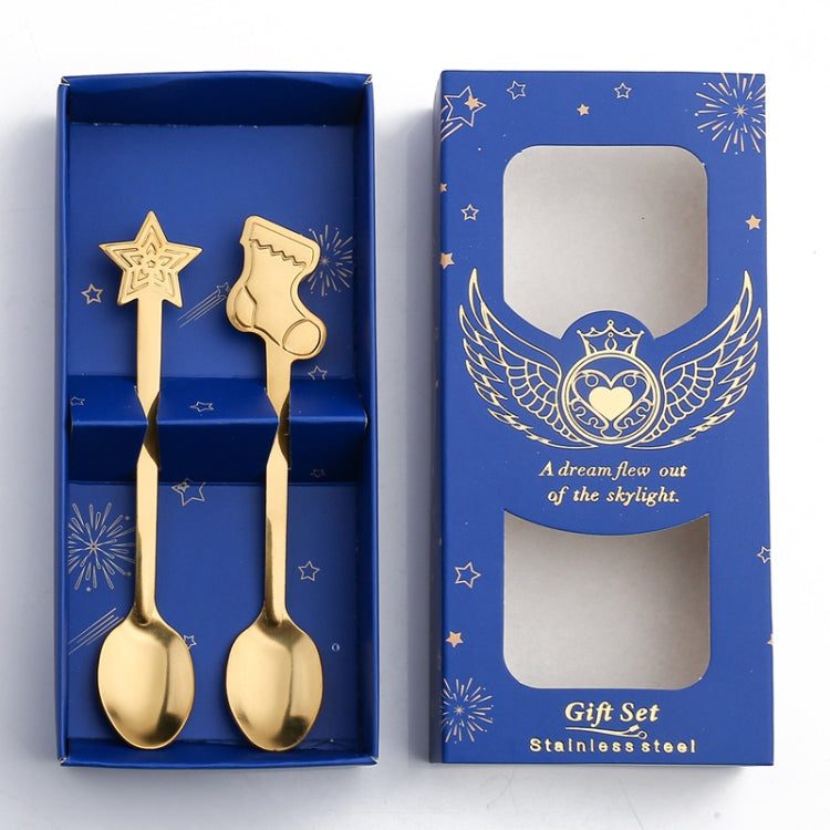 A festive 2pcs stainless steel spoon set featuring Christmas-themed designs including snowmen and gingerbread, perfect for holiday dining.